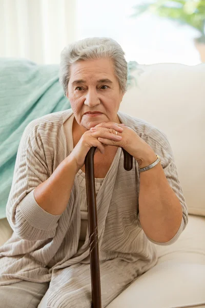 Senior woman with her walking stick — Stock Photo, Image
