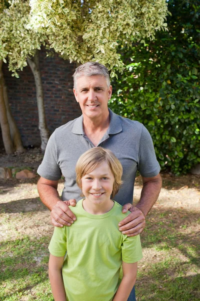Boy with his Grandfather looking at the camera — Stock Photo, Image