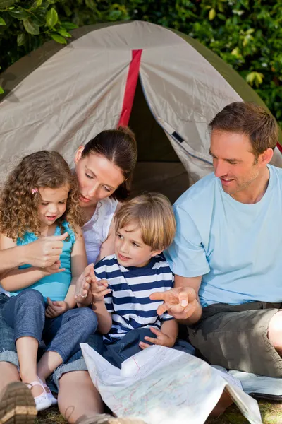 Adorable family camping in the garden — Stock Photo, Image