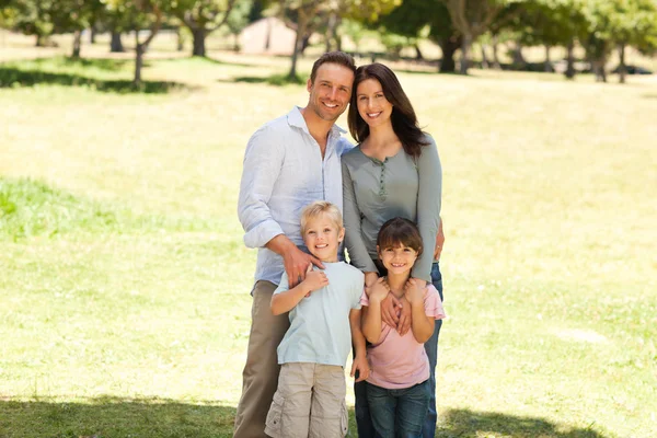 Portrait of a family in the park — Stock Photo, Image