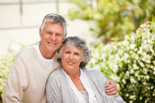 Retired couple looking at the camera Stock Picture