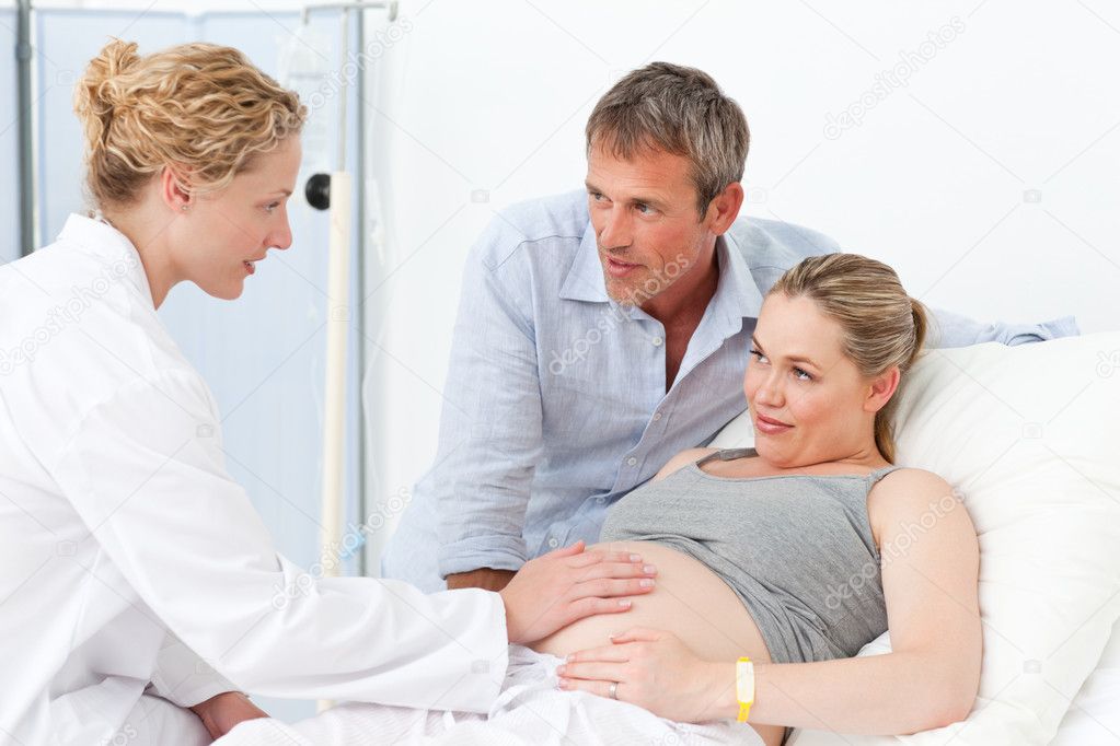 http://static9.depositphotos.com/1518767/1084/i/950/depositphotos_10845280-Pregnant-woman-with-her-husband.jpg