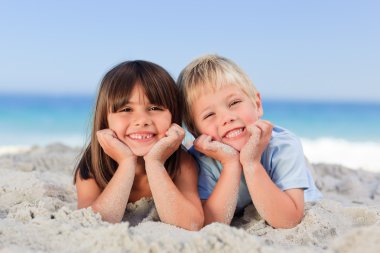 Children at the beach clipart