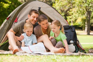 Family camping in the park clipart