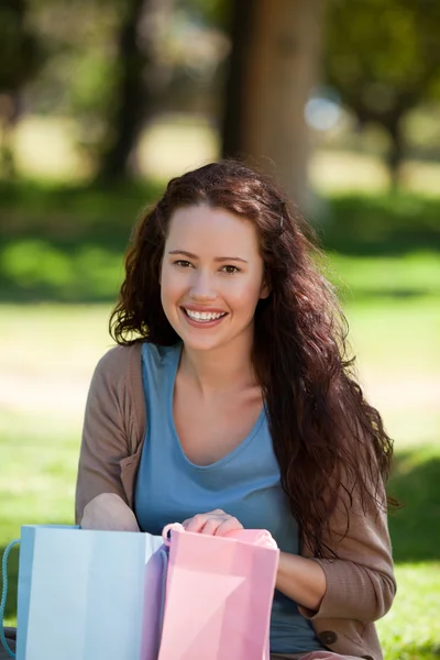 stock image Beautiful woman with her shopping bag