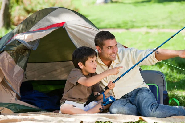 Son fishing with his father — Stock Photo, Image