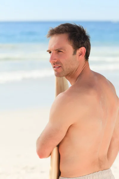 Pohledný muž s jeho Surf — Stock fotografie