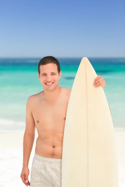 Man with his surfboard — Stock Photo, Image