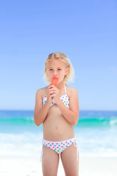 Little girl eating her ice cream — Stock Photo, Image