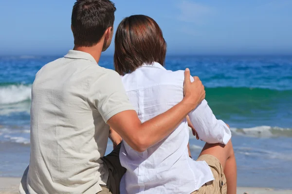Lovely couple at the beach — Stock Photo, Image