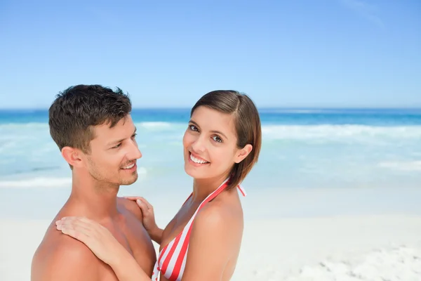 Lovely lovers at the beach — Stock Photo, Image