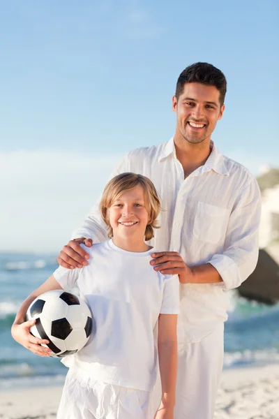 Father and his son on the beach — Stock Photo, Image