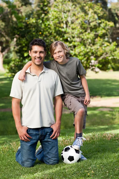 Father and his son in the park — Stock Photo, Image