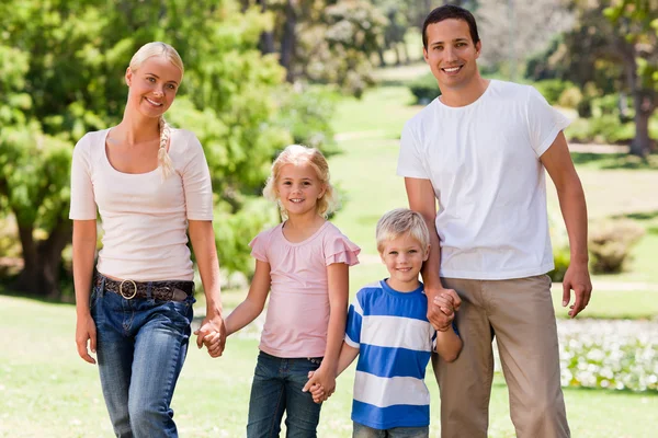 Adorable family in the park — Stock Photo, Image