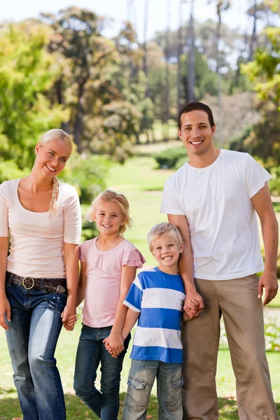 Adorable family in the park — Stock Photo, Image