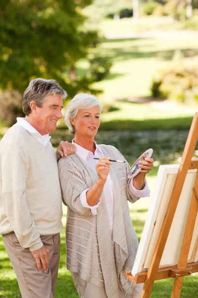 Peinture de couple senior dans le parc — Photo