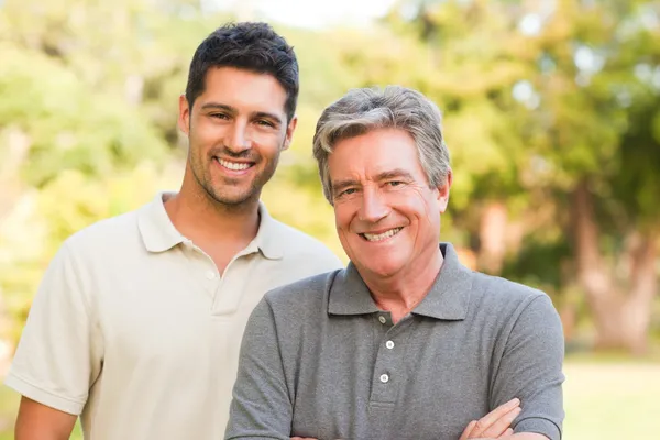 Father with his son looking at the camera — Stock Photo, Image