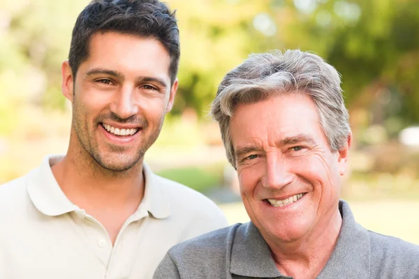 Father with his son looking at the camera — Stock Photo, Image