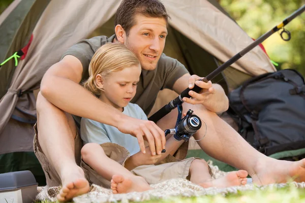 Father fishing with his son — Stock Photo, Image