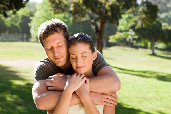 Man hugging his beautiful wife — Stock Photo, Image