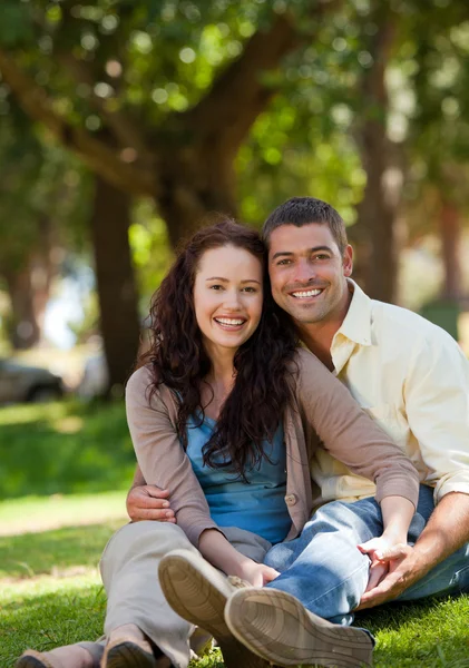 Couple sitting in the garden Stock Photo