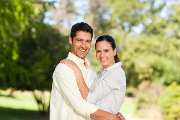 Happy lovers in the park Stock Image