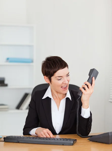 Angry secretary calling — Stock Photo, Image
