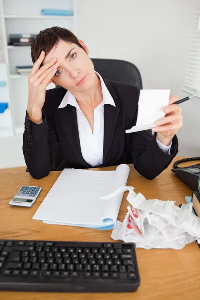Portrait of a female accountant checking receipts — Stock Photo, Image