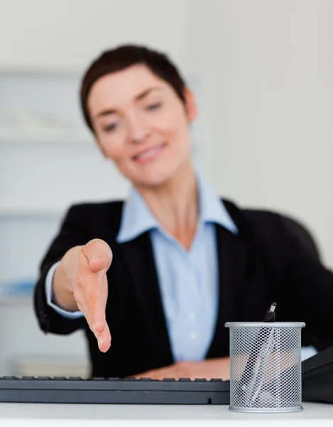 Portrait of a business woman giving her hand — Stock Photo, Image