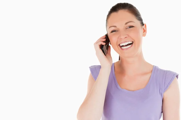Gorgeous woman on the phone while standing — Stock Photo, Image
