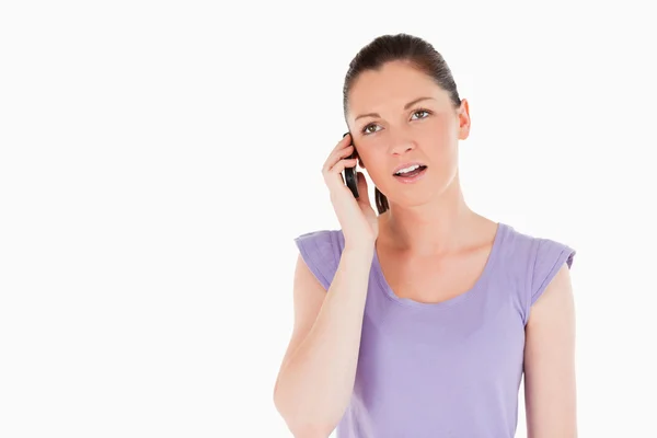 Pretty woman on the phone while standing — Stock Photo, Image