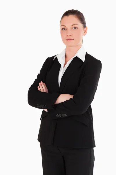 Bra kvinna i kostym poserar stående — Stockfoto