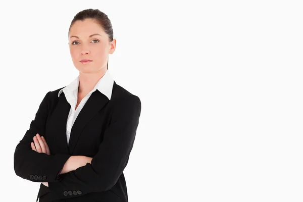 Attraktiv kvinna i kostym poserar stående — Stockfoto