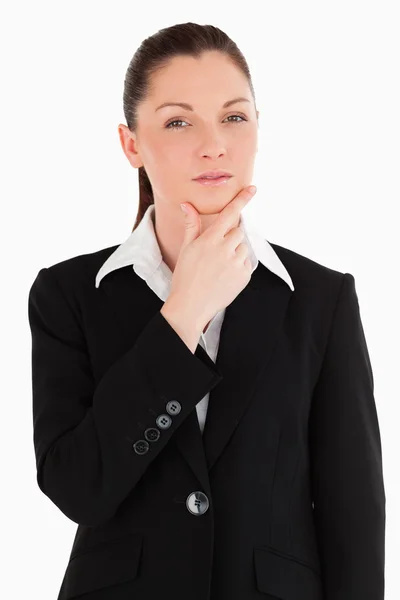 Lovely female in suit posing while standing — Stock Photo, Image