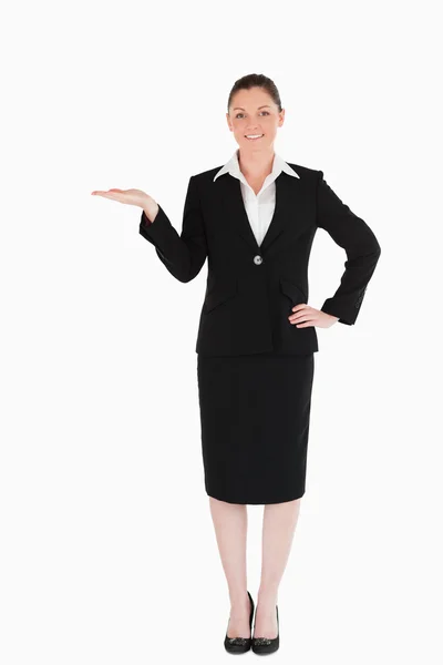 Charming woman in suit showing a copy space — Stock Photo, Image