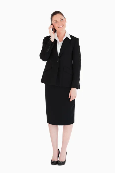 Beautiful woman in suit on the phone — Stock Photo, Image