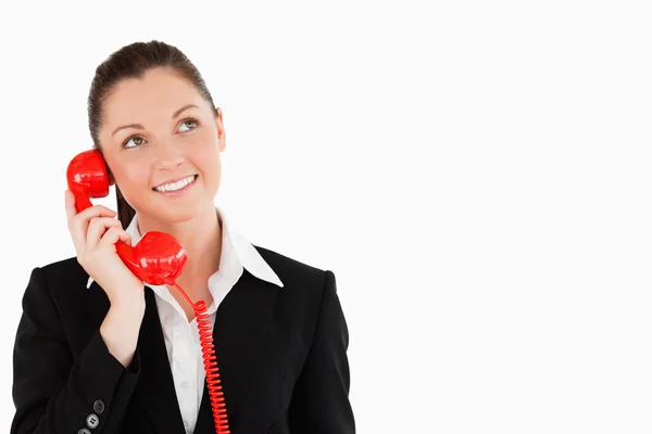 Beautiful female in suit on the phone — Stock Photo, Image