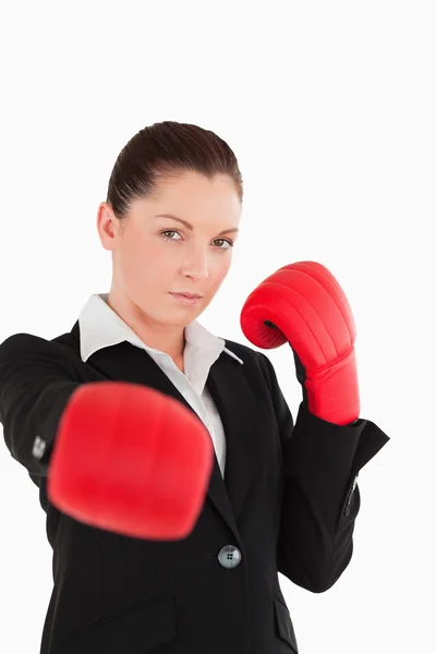 Pretty woman wearing some boxing gloves — Stock Photo, Image
