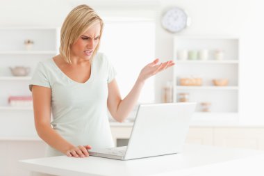 Upset woman looking at notebook without having any clue what to clipart