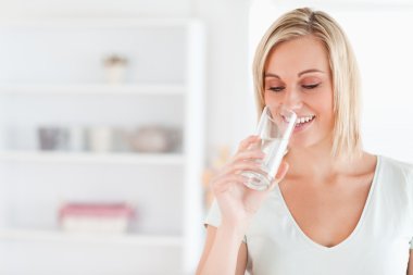 Gorgeous woman drinking water clipart