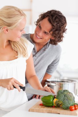 Portrait of a couple cooking clipart