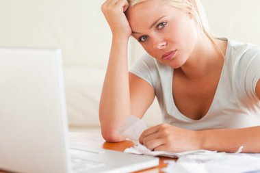 Stressed woman doing paperwork clipart