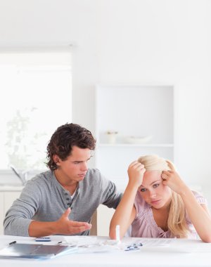 Man trying to comfort his wife clipart