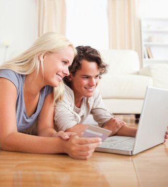 Cute couple purchasing online clipart