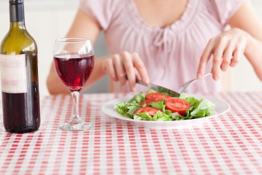 Cute Woman eating lunch and drinking wine clipart