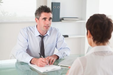 Manager interviewing a candidate clipart