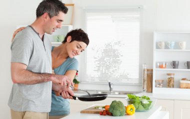 Woman peeking over her husband's shoulder clipart