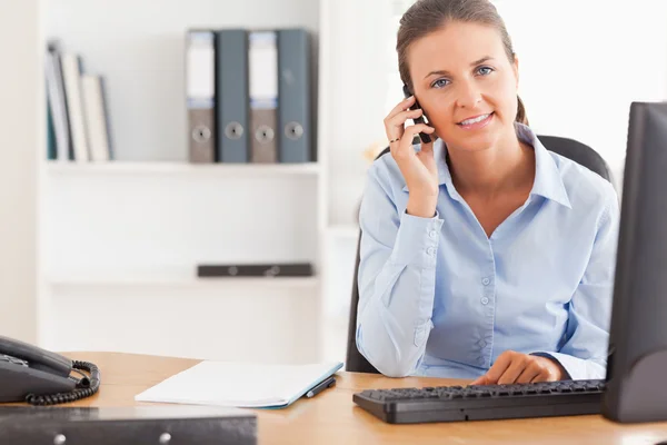 Serious businesswoman on the phone — Stock Photo, Image