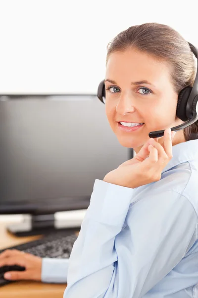 Close up of an office worker with a headset — Stock Photo, Image