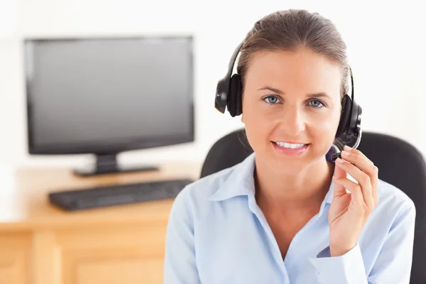 Office worker with a headset posing — Stock Photo, Image